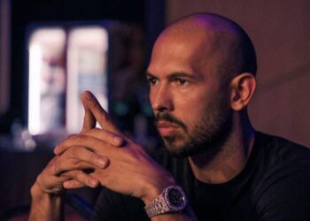 اندرو تیت ۵۰۰ هزار دلار بیت کوین را به سهام گیم استاپ و میم کوین تبدیل کرد